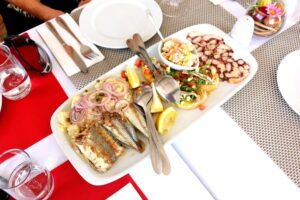 going on a food tour to taste delicious Croatian food - things to do in Dubrovnik when it rains